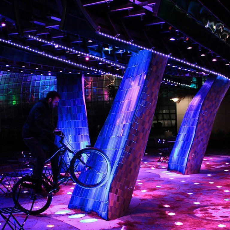 Bar columns and ceiling lit with purple and blue UV LED strip lights