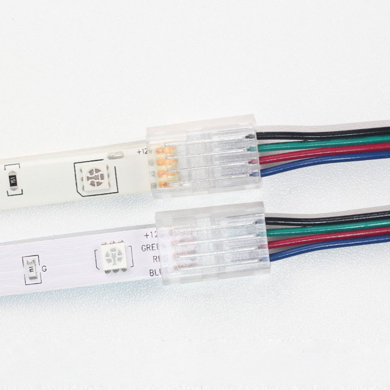 4kolíkový průhledný RGB LED konektor – pásek na vodič – pro pásek LED SMD 4kolíkový průhledný RGB LED konektor – pásek na vodič – pro pásek LED SMD