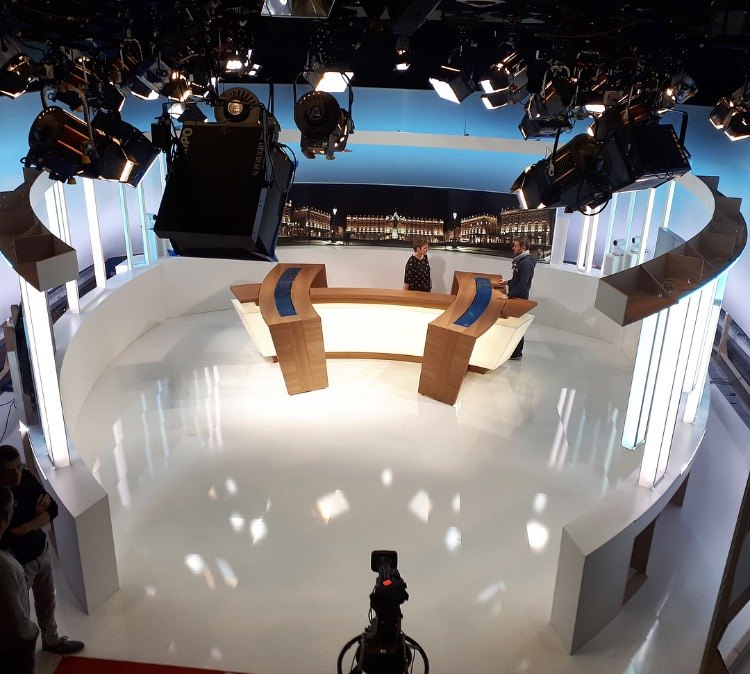 TV studio desk outlined with addressable LED strip