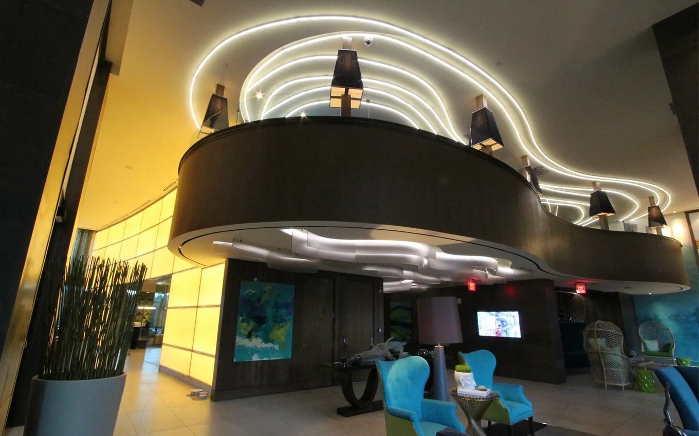 LED neon flex tracing curved edges in a hotel lobby