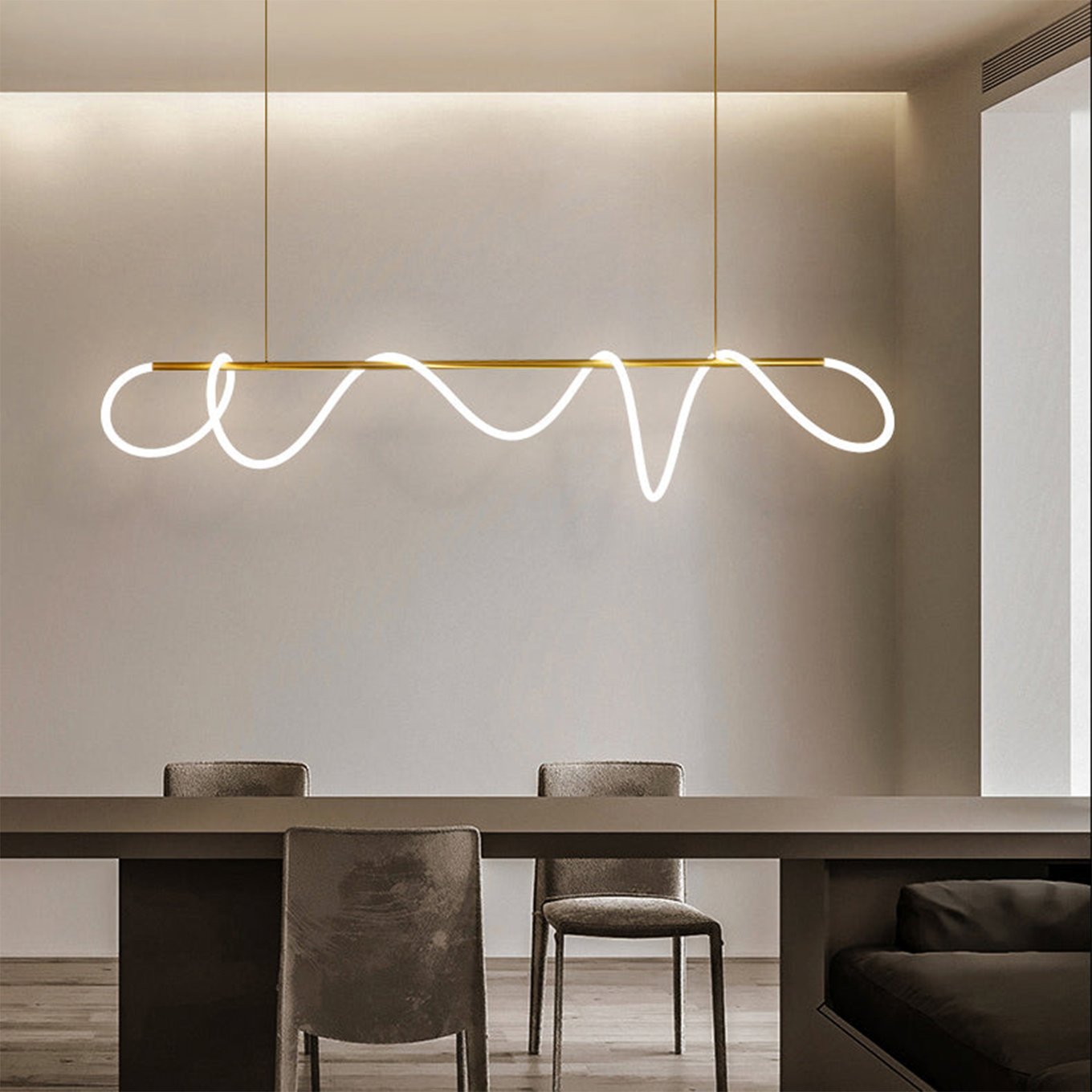 White LED neon flex shaped into a wave pendant over a dining table