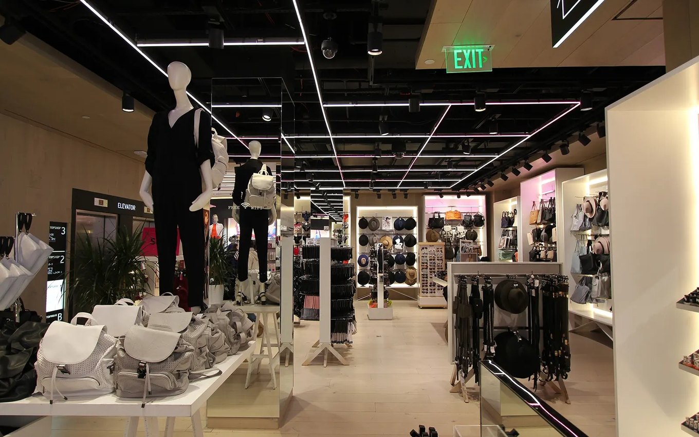 LED neon flex lines across a retail store ceiling