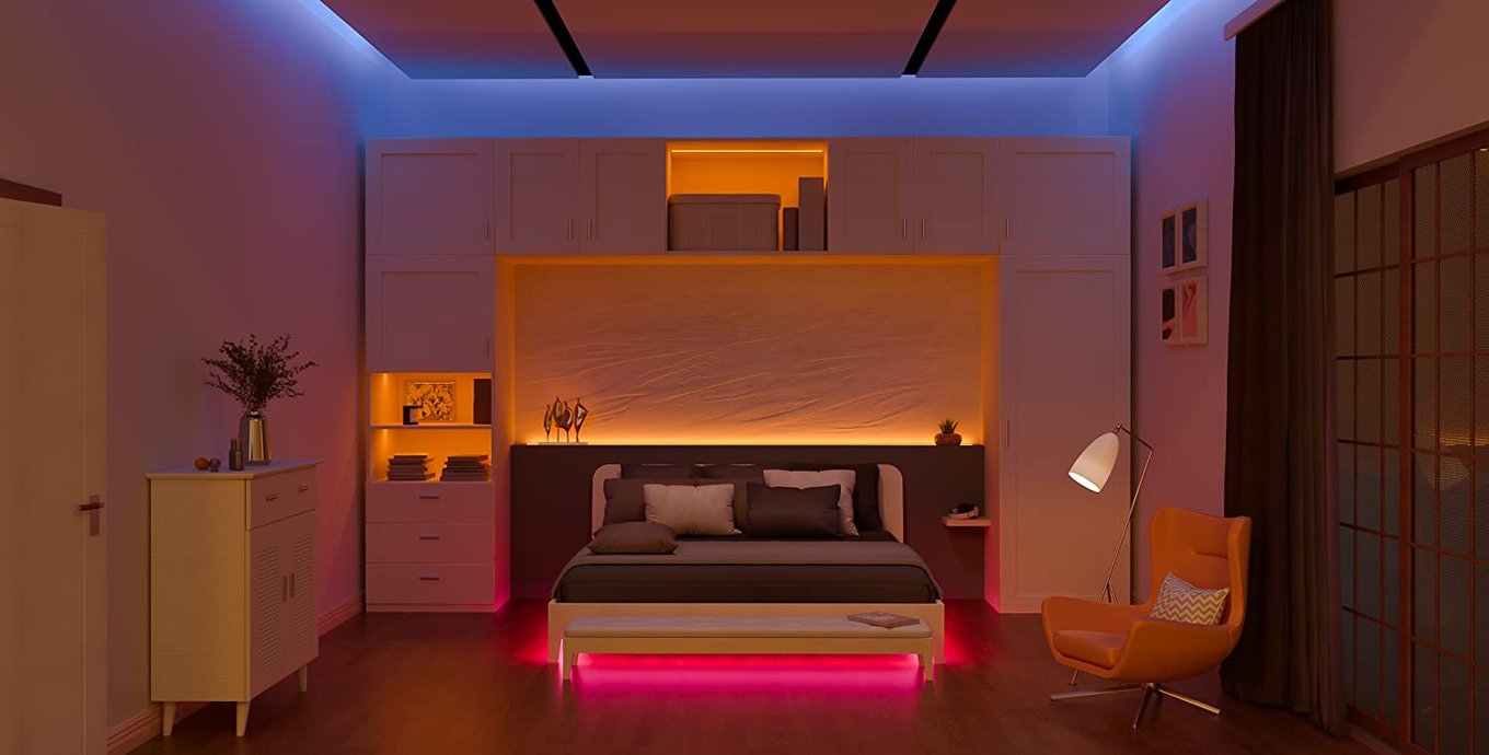Bedroom with LED strip in the ceiling cove and colour-changing strip under the bed