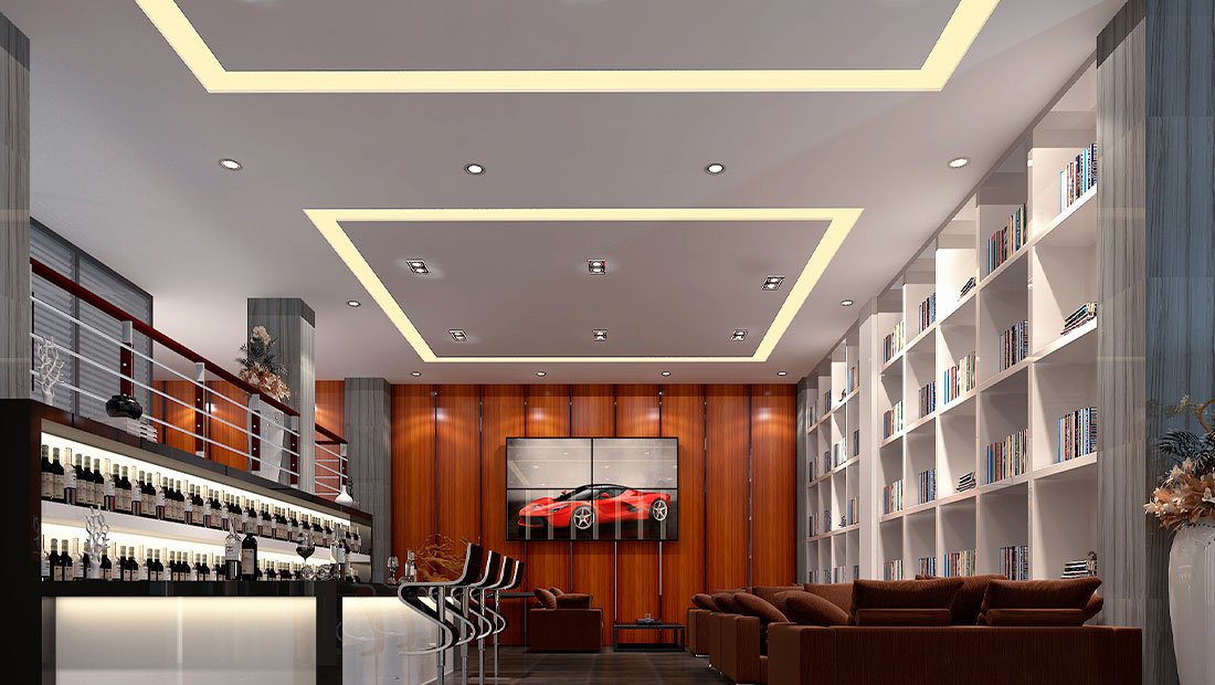 Living room with LED strip cove lighting around the ceiling recess