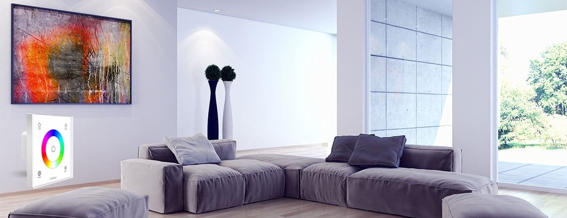 White living room with an LED strip wall wash