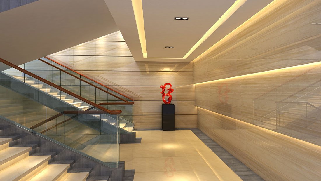 Warm white LED strip cove lighting in a lobby and along a staircase