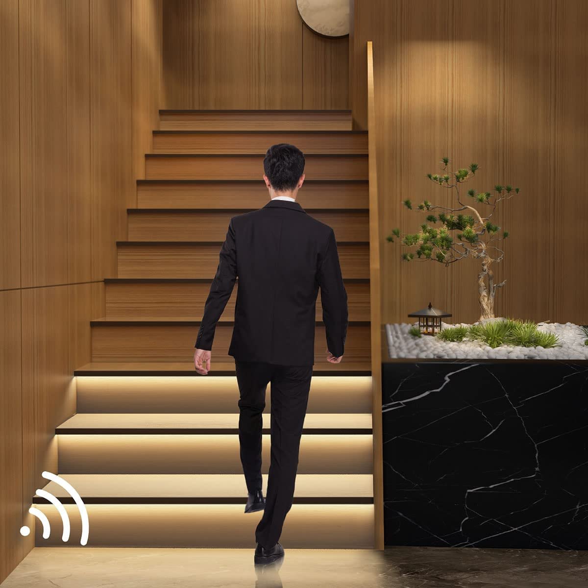 Motion sensor stair lights switching on as someone walks up