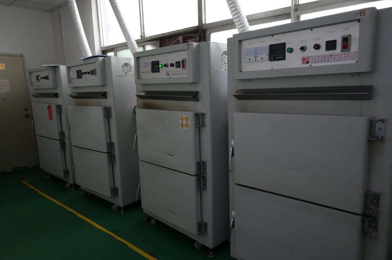 Row of industrial curing ovens