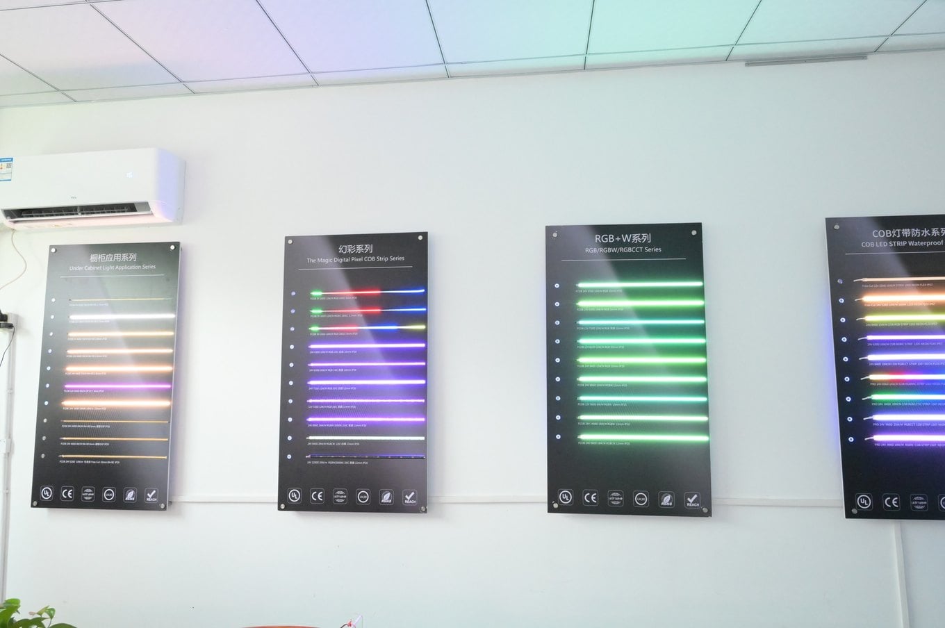 Sample boards of lit LED strips in the showroom