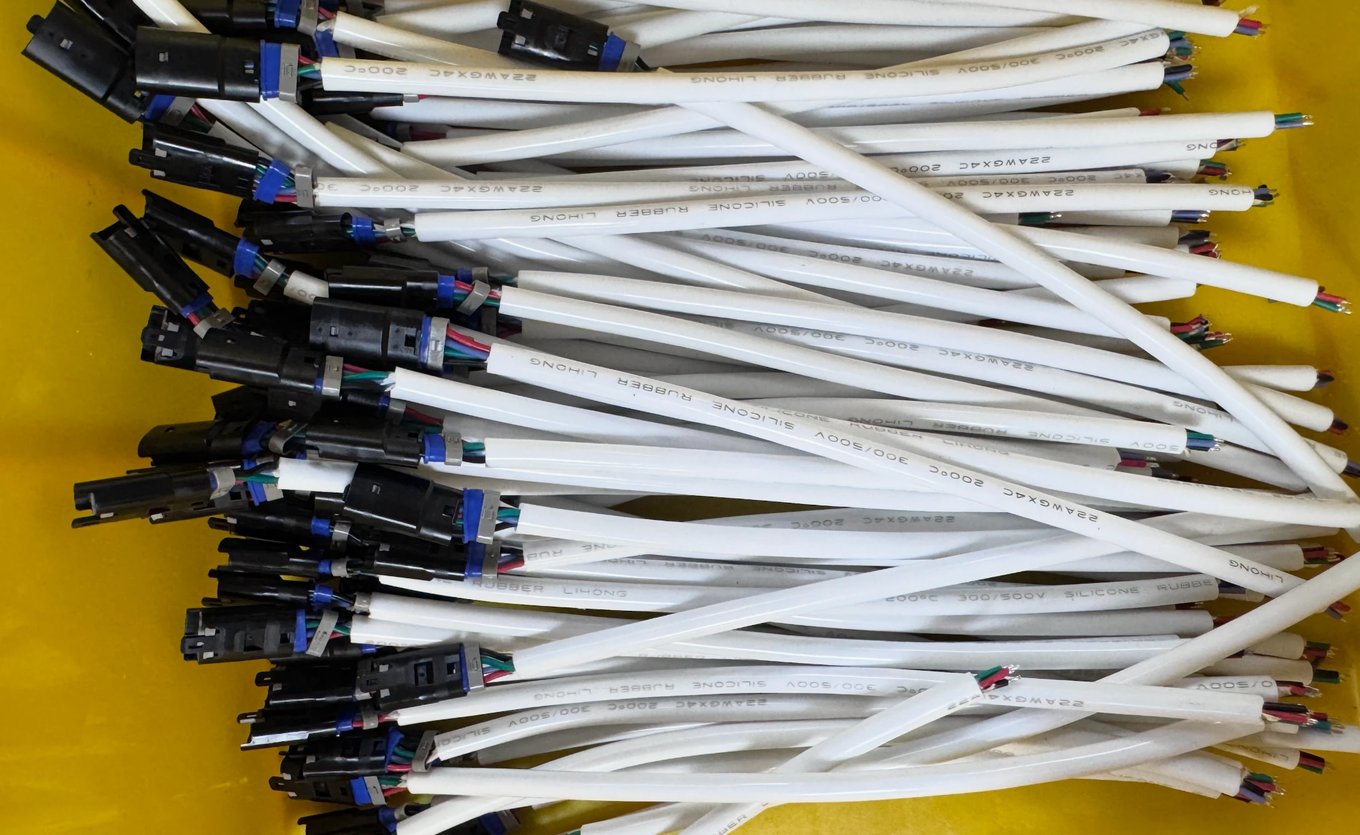Custom RGB connector wire harnesses being assembled at the SuperLightingLED factory